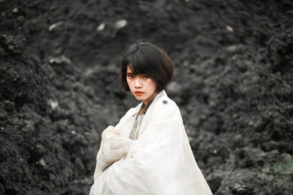 Portrait of a woman in fashionable outfit, half body view