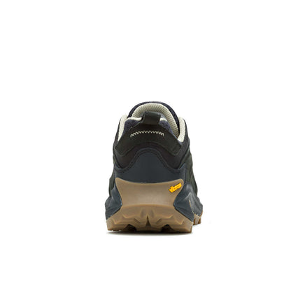 Black and navy trail running shoe with Vibram sole, deep traction lugs, reinforced toe cap, mesh panels, and lace-up closure.