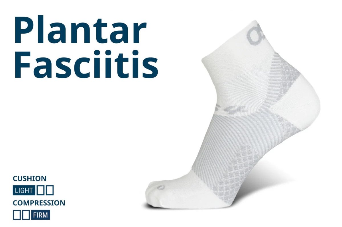 Low-cut black and gray athletic socks with ribbed and mesh zones, shown at an angle to highlight reinforced heel and toe area