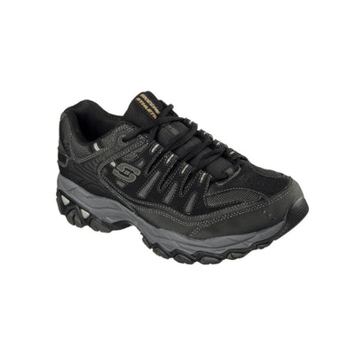 Black Skechers athletic sneaker with rugged sole, lace-up design, and visible Skechers logo on the side, designed for outdoor