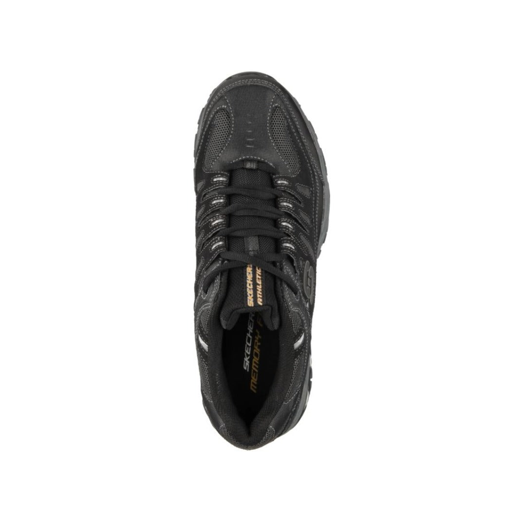 Black Skechers athletic sneaker with rugged sole, lace-up design, and visible Skechers logo on the side, designed for outdoor