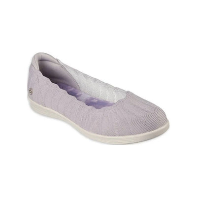 Light gray knit slip-on shoe with scalloped collar, white sole, and small metallic emblem near the heel.